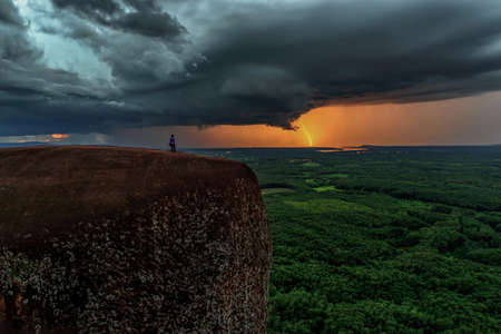 Nature force background - bright lightning in dark stormy sky in Mekong River of Tree rock Whale...