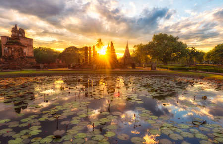 The sun set of Sukhothai historical park Thailandの写真素材