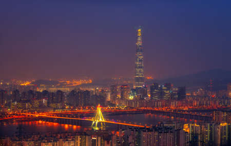 Korea,Seoul city skyline and Lotte World mall at nigth.