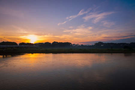The sun set of Ping river at Tak,Thailandの写真素材