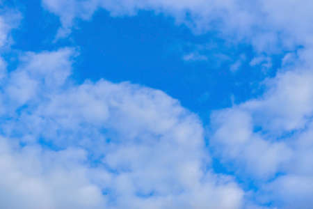 white clouds on the blue skyの写真素材