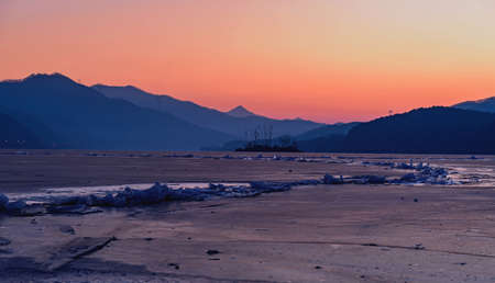 The sun sets of glacier in winter,Koreaの写真素材