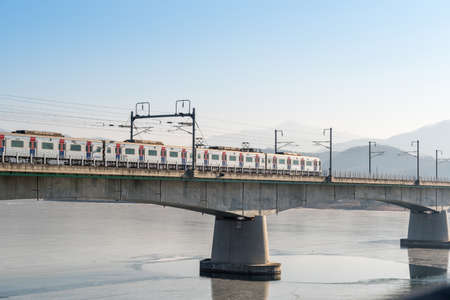 The train is traveling to Seoul railway station in Koreaのeditorial素材