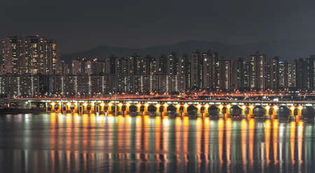 Seoul city building skyline at night in Korea.の写真素材