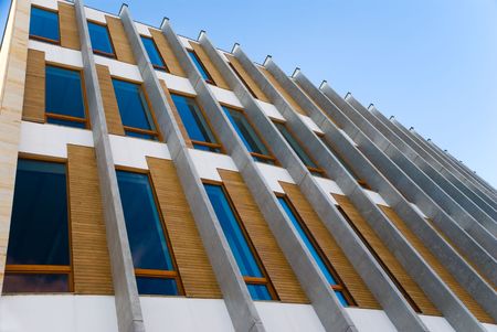 Architecture pattern of windows with modern wooden and concrete decorative elements