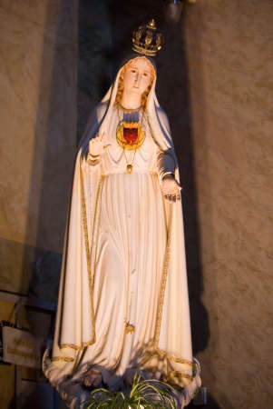 Statue of Madonna with open arms in The Basilica, Eger, Hungaryの写真素材