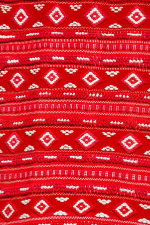 Traditional hungarian pattern on hand-made woolen carpetの写真素材