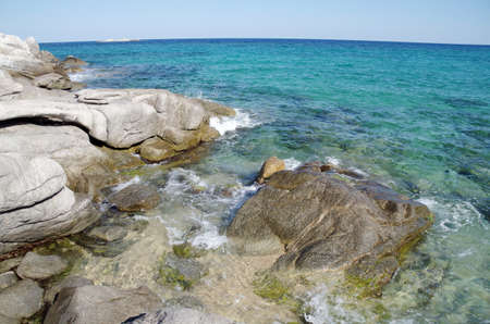 Bizarre rocks and beautiful blue sea in Sithonia, Greeceの写真素材