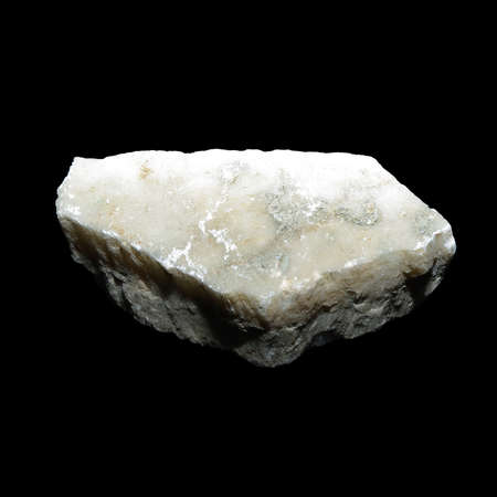 Crude selenit stone on black background
