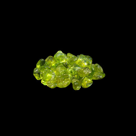 Natural chrysolite (peridot) on black backgroundの写真素材
