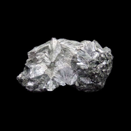 Natural crude seraphinite stone on black background
