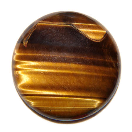 Tiger eye round cabochon on white backgroundの写真素材