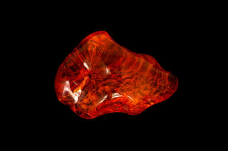 Baltic amber closeup on black background