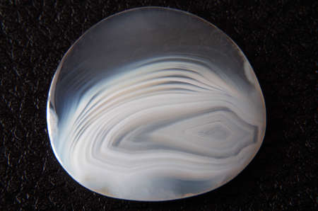 Beautiful botswana agate closeup on black backgroundの写真素材