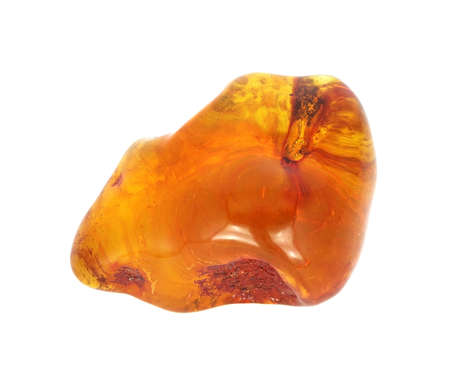 Baltic amber closeup on white backgroundの写真素材