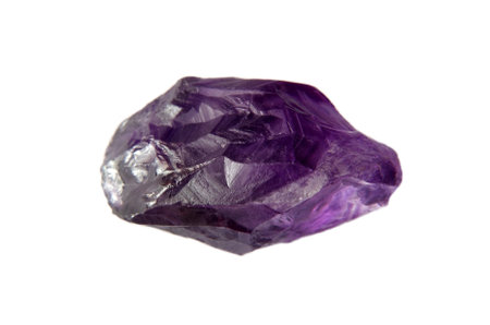 Crude amethyst stone on white backgroundの写真素材