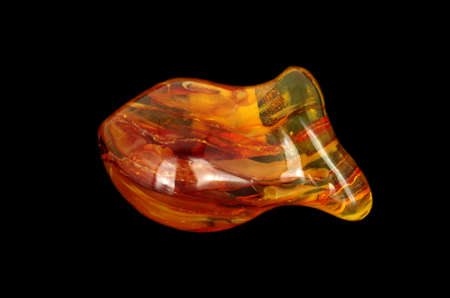 Baltic amber closeup on black backgroundの写真素材