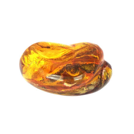 Baltic amber closeup on white backgroundの写真素材