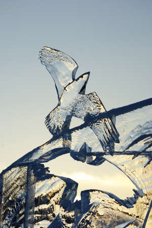 Sculpture of a bird made of ice close-upの写真素材