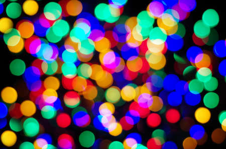 A lot of colorful blurred lights all colors of the rainbowの写真素材