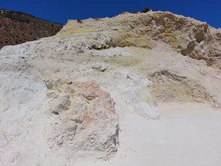 Yellow covered with poisonous sulfur walls of the volcano caldera on the island of Nisyros in Greeceの写真素材