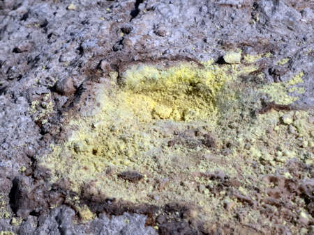 Poisonous sulfur close-up at the bottom of a volcano crater on the island of Nisyros in Greeceの写真素材
