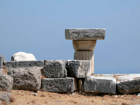 Remains of huge columns in the ruins of an ancient agora in Greeceの写真素材