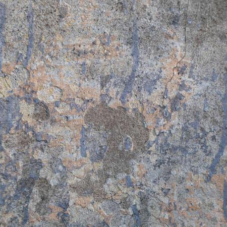 Peeling and cracked wall of an old house. Grunge background. Square shot.の写真素材