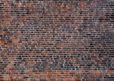 Texture of old dark red brick wall. Nice background for your design.