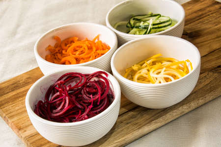 Spiralized vegetables in the white bowlsの写真素材