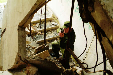 The soldier with a pistol performs antiterrorist operation.の写真素材