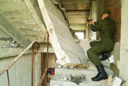 The soldier with a pistol performs antiterrorist operation.の写真素材