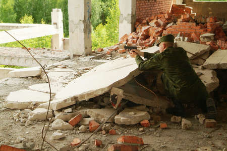 The soldier with a pistol performs antiterrorist operation.の写真素材