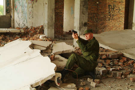 The soldier with a pistol performs antiterrorist operation.の写真素材
