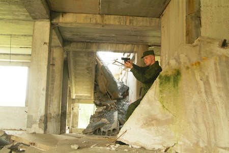 The soldier with a pistol performs antiterrorist operation.の写真素材