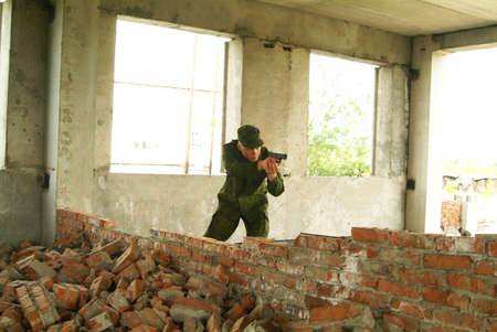 The soldier with a pistol performs antiterrorist operation.の写真素材