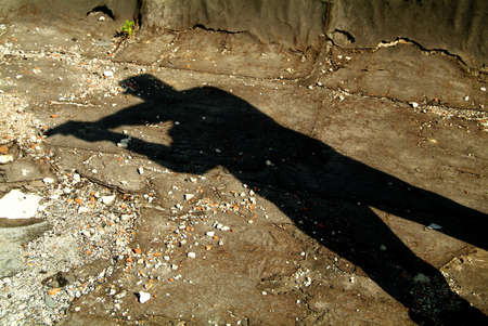 The Shadow of soldier with a gunの写真素材