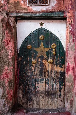 Entrance to the house in an alley of Marrakech Medina.の写真素材