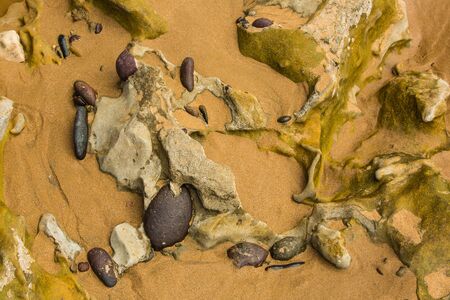 Atlantic coast of Morocco is made up of sand and eroded sandstone rocks.