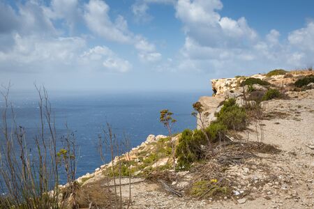 Rocky cliff in Siggiewi area on the Malta island, Mediterranean seaの写真素材