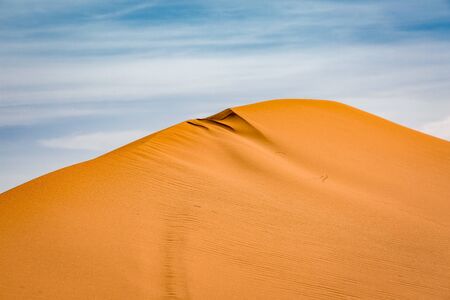 Sand dunes of the Sahara desert near Merzougha in Moroccoの写真素材