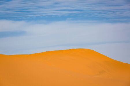 Sand dunes of the Sahara desert near Merzougha in Moroccoの写真素材