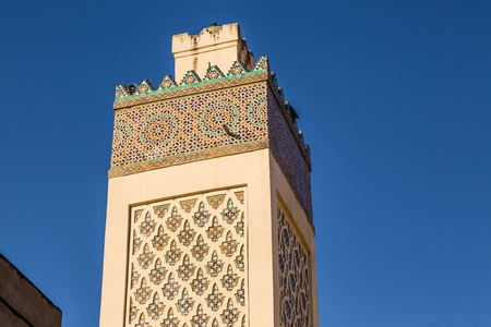 Minaret of a mosque in Medina Fes, Moroccoの写真素材
