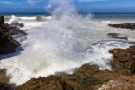 Stormy Atlantic under the cliffs on coast near Rabat-Sale, Moroccoの写真素材