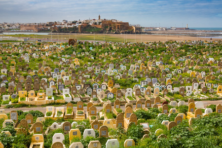 Sale, Morocco - March 06, 2017: Arab cemetery on the edge of Sale. In the background is Medina of Rabat, Morocco.のeditorial素材