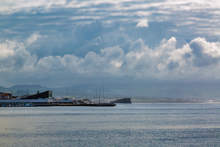 Seafront Ponta Delgada with the port. Ponta Delgada on the island of Sao Miguel is the capital of the Azores.の写真素材
