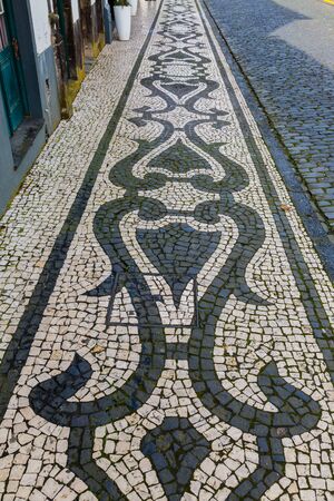 Streets and walkways of Ponta Delgada. Ponta Delgada on the island of Sao Miguel is the capital of the Azores, Portugal.の写真素材