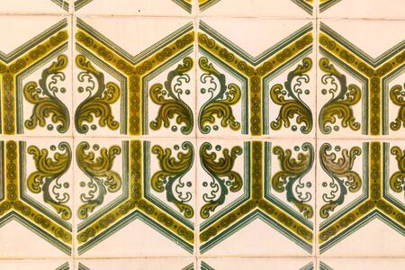 Typical decoration of the facade of the house . Traditional ceramic tiles .