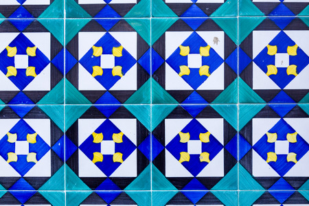 Typical decoration of the facade of the house in Lisbon. Traditional ceramic tiles Azulejos.の写真素材