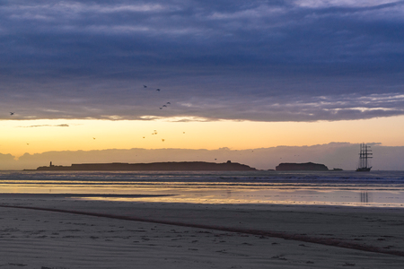 Beautiful atmosphere early evening at Tagharte Beach near Essaouira, Moroccoの写真素材